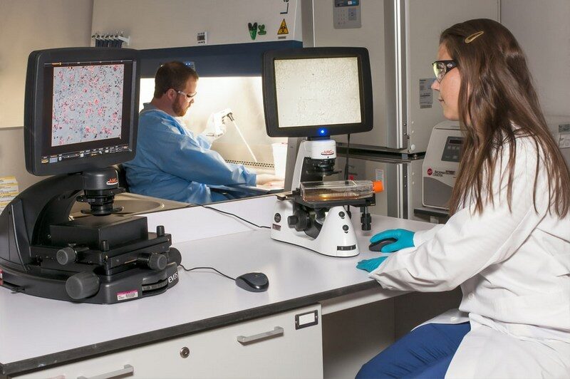 happy relationship, two people in scientist lab