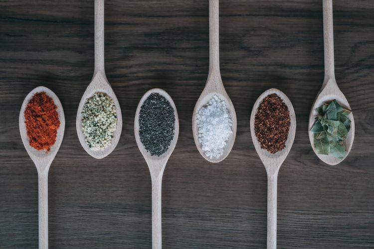 Spicey, An image of different food spices on a spoon