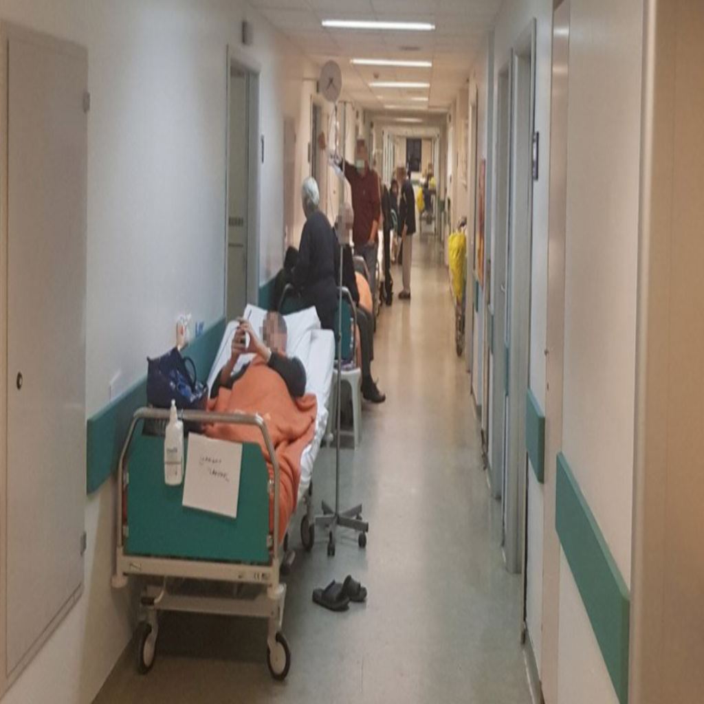 hallway of the hospital with full capacity, due to Covid, happiness