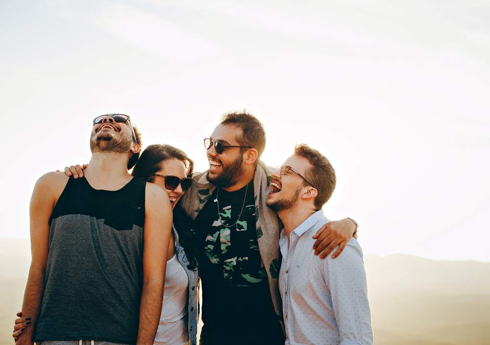 Unconditional happiness. a group of people laughing