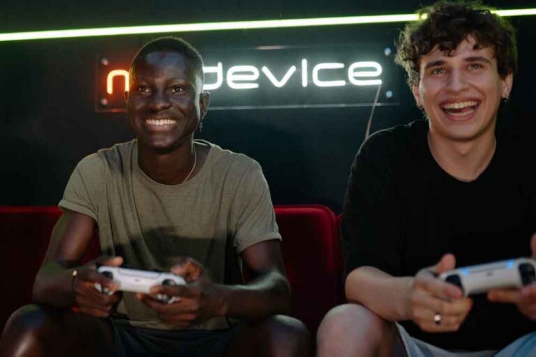 violent video games, Friends Sitting on the Couch and Holding Game Controllers
